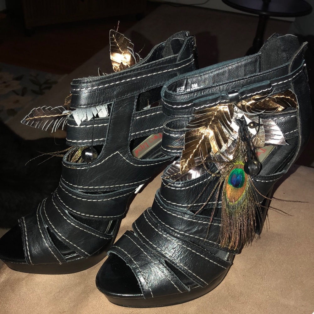 Black leather, cutout platform w/feathers